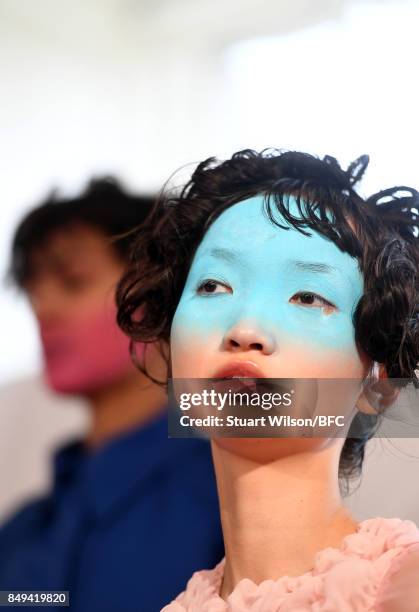 Models showcase designs at the minki presentation during London Fashion Week September 2017 on September 19, 2017 in London, England.