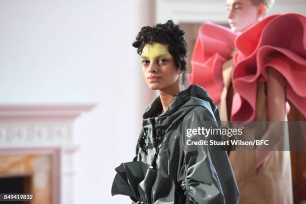 Models showcase designs at the minki presentation during London Fashion Week September 2017 on September 19, 2017 in London, England.