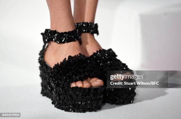 Models showcase designs at the minki presentation during London Fashion Week September 2017 on September 19, 2017 in London, England.