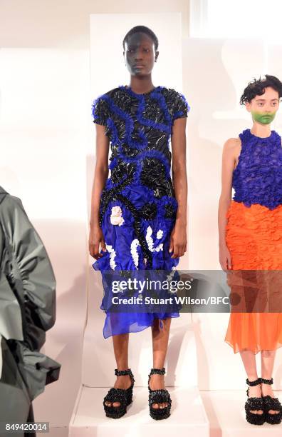 Models showcase designs at the minki presentation during London Fashion Week September 2017 on September 19, 2017 in London, England.