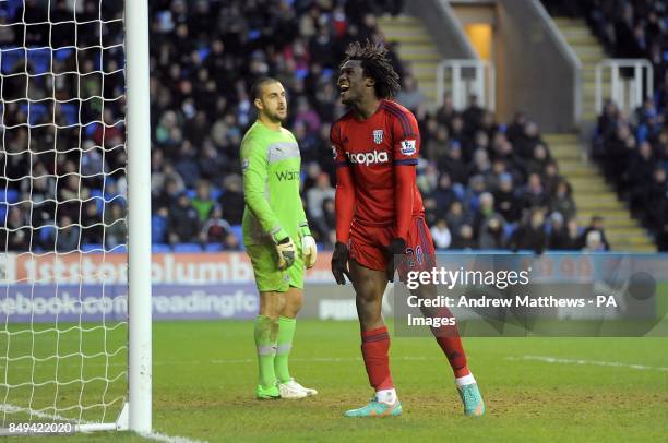 West Bromwich Albion's Romelu Lukaku looks dejected after his header hit the post as Reading goalkeeper Adam Federici looks on