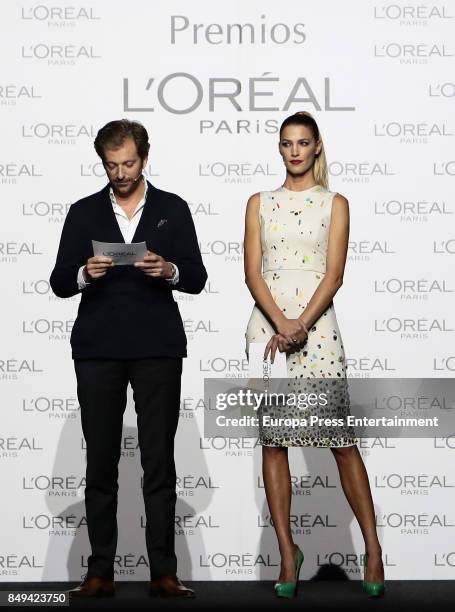 Paris Brand General Manager Gregory Recoing and model Laura Sanchez present the L'Oreal Paris Award during the Mercedes-Benz Fashion Week Madrid...