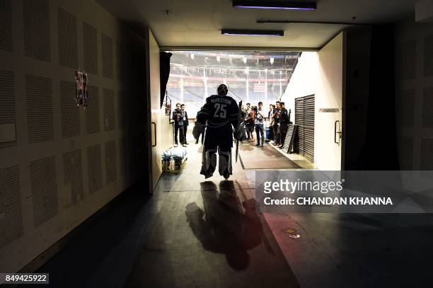 Vancouver Canucks' goaltender Jacob Markstorm enters the arena for an ice hockey practice session during the 2017 NHL China Games in Shanghai on...