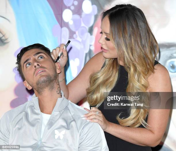 Stephen Bear and Charlotte Crosby attend a photocall for 'Just Tattoo Of Us: Can You Deal With The Reveal?' pop-up tattoo parlour on September 19,...