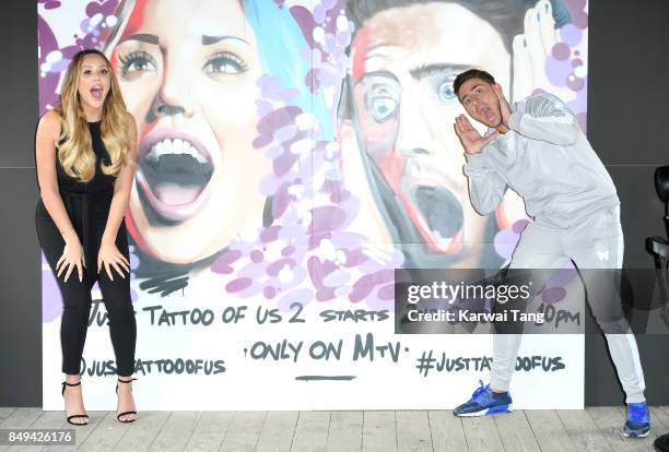 Stephen Bear and Charlotte Crosby attend a photocall for 'Just Tattoo Of Us: Can You Deal With The Reveal?' pop-up tattoo parlour on September 19,...