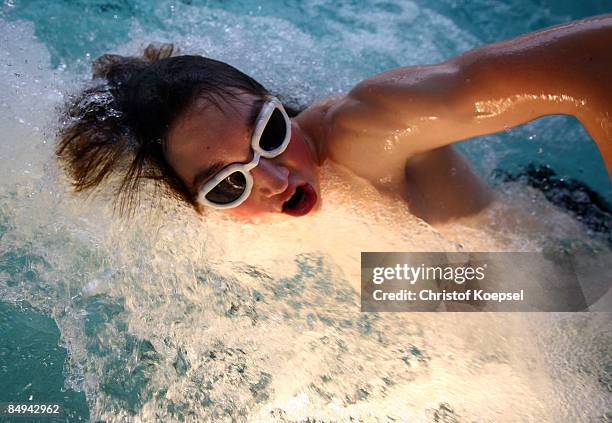 Triathlete Valentin Lenz swims against the counter-current system during a sports performance diagnostic at the Medicos Auf Schalke rehabilitation,...