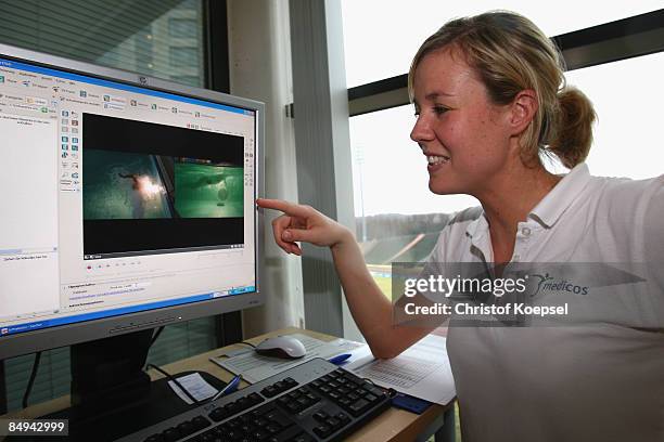 Sports scientist Karen Stein watches the filming results of swimming during a sports performance diagnostic at the Medicos Auf Schalke...