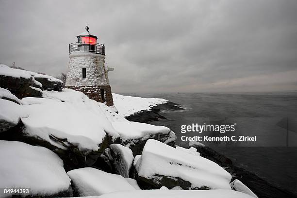 castle hill in snow - newport rhode island stock-fotos und bilder
