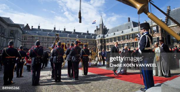 Dutch King Willem-Alexander and Queen Maxima arrive in the Glass Carriage during the 'Prinsjesdag' at the Binnenhof in The Hague on September 19,...