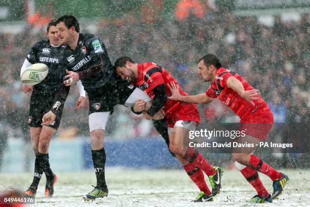 Leicester's Matt Smith is tackled by Toulouse's Luke McAlister during the Heineken Cup, Pool Two match at Welford Road, Leicester.