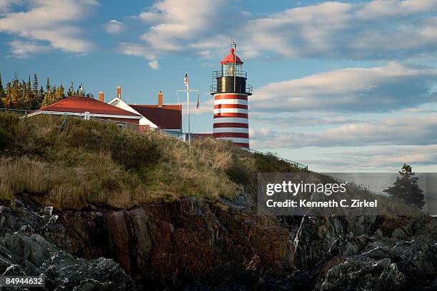 west quoddy head light - west quoddy head lighthouse stock-fotos und bilder