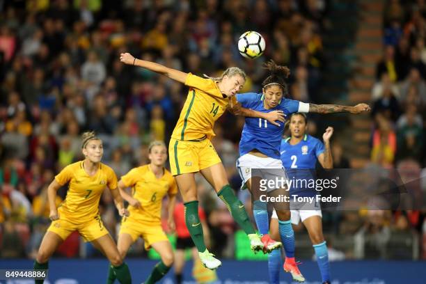 Alanna Kennedy of the Matildas and Cristiane Rozeira de Souza Silva of Brazil contest a header during the Women's International match between the...
