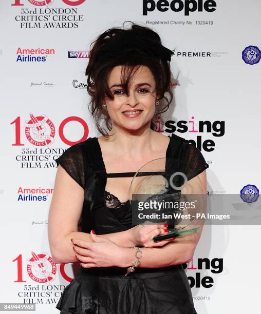 Dilys Powell for Award for Excellence In Film Award winner Helena Bonham Carter in the press room at the 2013 London Critics' Circle Film Awards at...
