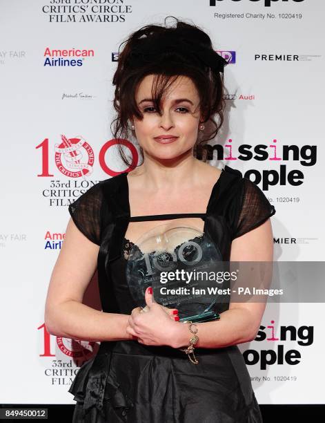 Dilys Powell for Award for Excellence In Film Award winner Helena Bonham Carter in the press room at the 2013 London Critics' Circle Film Awards at...