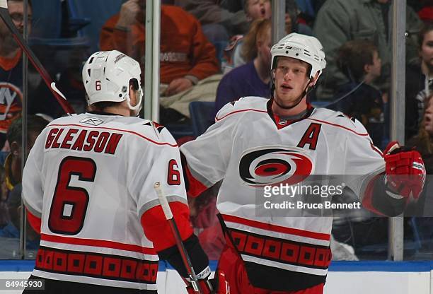 Tim Gleason and Eric Staal of the Carolina Hurricanes celebrate a goal against the New York Islanders on February 19, 2009 at the Nassau Coliseum in...