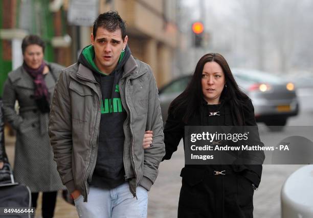 Barri White arrives with an unidenitified woman at Luton Crown Court where he is due to give evidence at the trial of Shahidul Ahmed, who is accused...