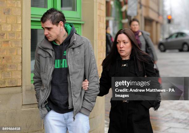 Barri White arrives with an unidenitified woman at Luton Crown Court where he is due to give evidence at the trial of Shahidul Ahmed, who is accused...