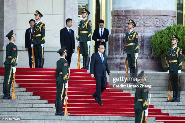 Chinese Premier Li Keqiang attends a welcoming ceremony for Singapore Prime Minister, Lee Hsien Loong outside the Great Hall of the People on...