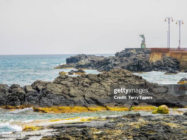 seaside at giardini naxos in taormina. - naxos sicily stock pictures, royalty-free photos & images