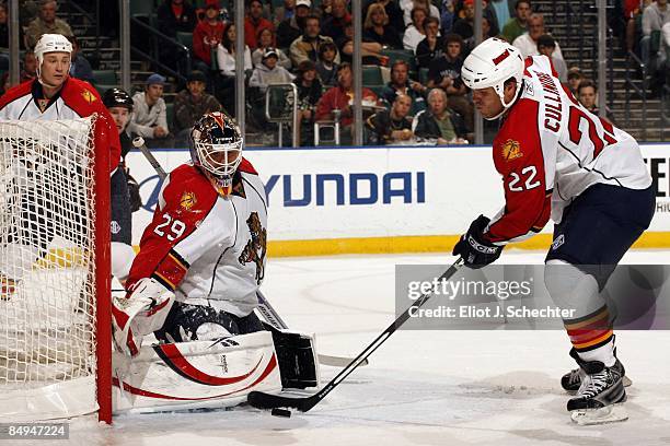 Jassen Cullimore of the Florida Panthers helps Goaltender Tomas Vokoun defend the net against the Chicago Blackhawks at the Bank Atlantic Center on...