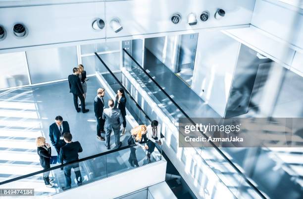 conference meeting - office space elevated view stock pictures, royalty-free photos & images