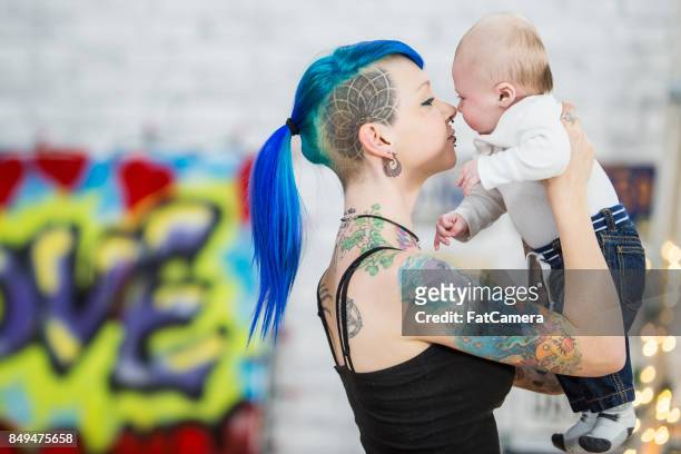 260 Mom And Son Tattoo Designs Photos and Premium High Res Pictures - Getty  Images