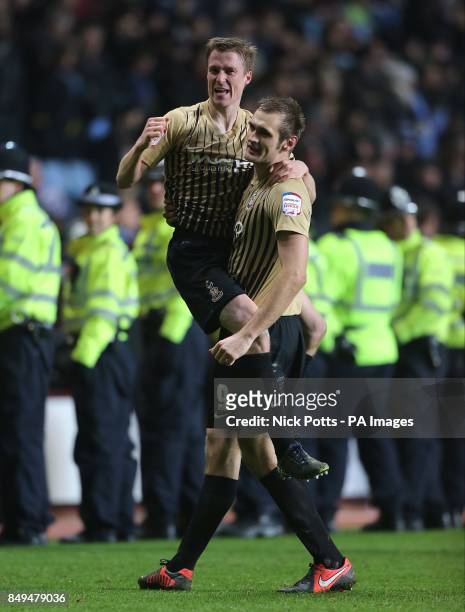 Bradford City's James Hanson and Stephen Darby celebrate after the game
