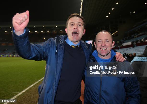 Bradford City's manager Phil Parkinson and his assistant Steve Parkin celebrate after beating Aston Villa on aggregate