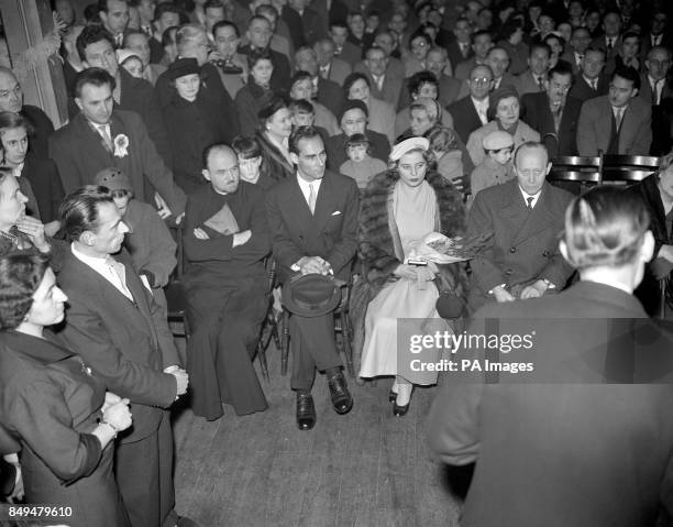 The betrothed couple, Princess Margarita of Baden and Prince Tomislav of Yugoslavia, seated between Reverend M. Nikolitch, left, and Prince Wolfgang...