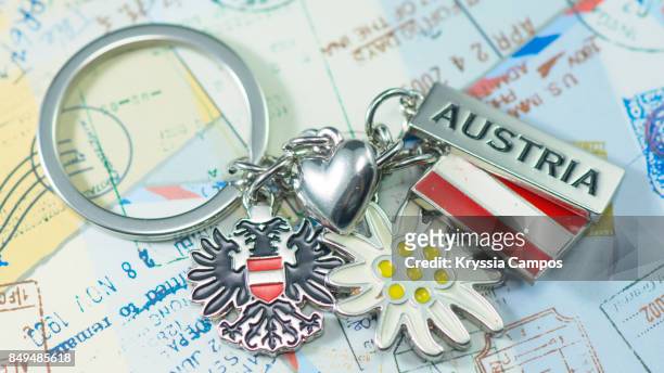 close-up of keychain souvenir from austria - souvenirs stock-fotos und bilder