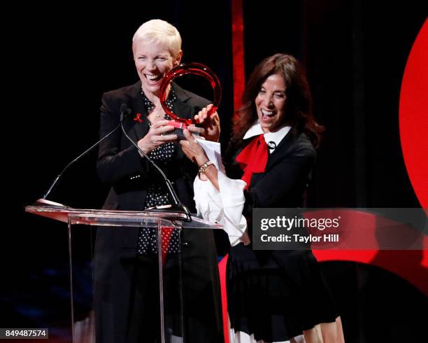 Annie Lennox accepts the George Harrison Award from Olivia Harrison during "Global Citizen Live!" at NYU Skirball Center on September 18, 2017 in New...