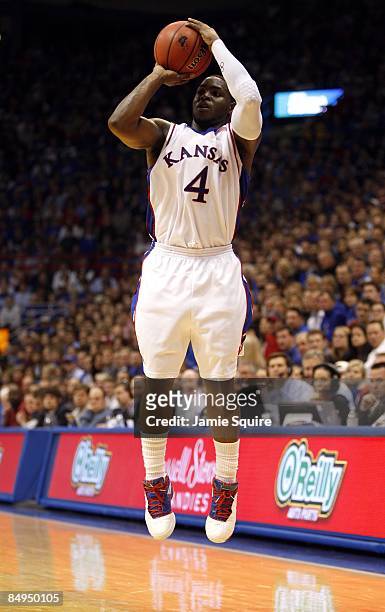 Sherron Collins of the Kansas Jayhawks shoots the jump shot during the game against the Iowa State Cyclones on February 18, 2009 at Phog Allen...