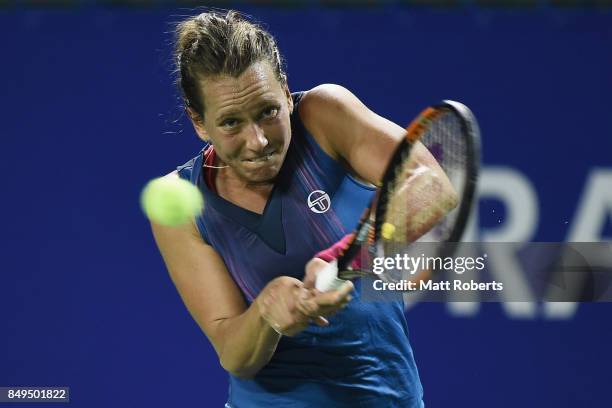 Babora Strycova of Czech Republic plays a backhand against Magdalena Rybarikova of Slovakia during day two of the Toray Pan Pacific Open Tennis At...