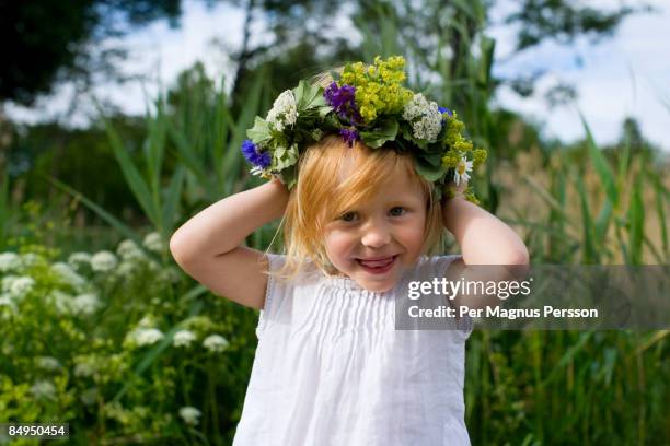 a little girl celebrating midsummer sweden. - summer solstice stock pictures, royalty-free photos & images
