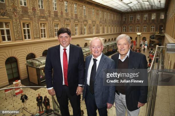 Rod Laver of Australia poses after unveiling a commemorative stamp with Martin Elkan , Director General of the Czech Post and former Czech player Jan...