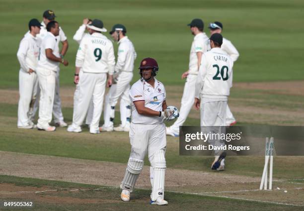 Rory Kleinveldt of Northamptonshire walks away after being bowled by Samit Patel during the Specsavers County Championship Division Two match between...