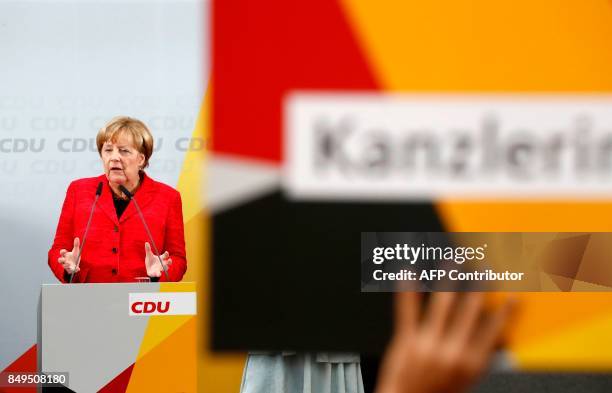 German Chancellor and Christian Democratic Union's main candidate Angela Merkel delivers her speech during an election rally in Wismar, northern...