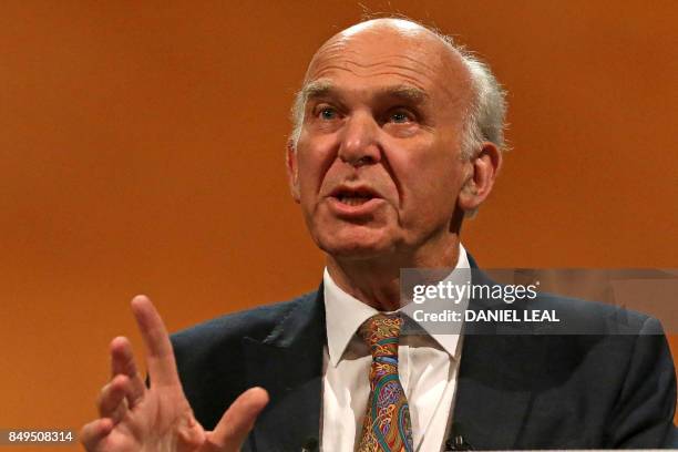 Britain's leader of the Liberal Democrats, Vince Cable delivers his Keynote Speech at the party's annual conference in Bournemouth, southern England,...