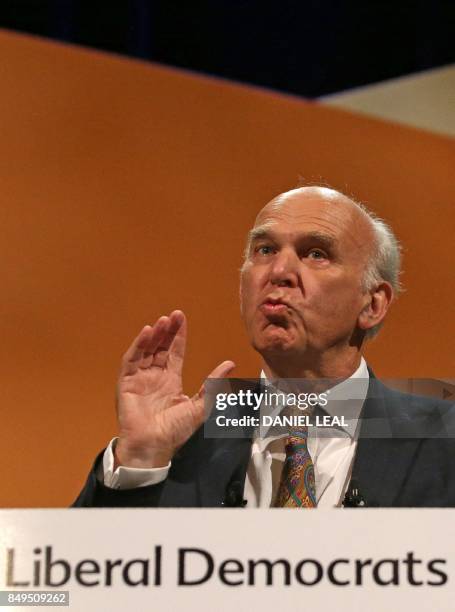 Britain's leader of the Liberal Democrats, Vince Cable delivers his Keynote Speech at the party's annual conference in Bournemouth, southern England,...