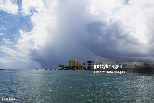 buildings at the waterfront, condado beach, san juan, puerto rico - condado beach stock pictures, royalty-free photos & images