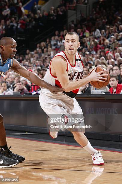 Sergio Rodriguez of the Portland Trail Blazers looks to pass the ball against Mike James of the Washington Wizards during the game on January 24,...