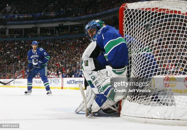 Roberto Luongo of the Vancouver Canucks makes a save during their game against the Montreal Canadiens at General Motors Place on February 15, 2009 in...