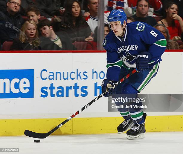 Sami Salo of the Vancouver Canucks skates up ice with the puckÊduring their game against the Montreal Canadiens at General Motors Place on February...