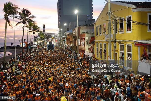 Revellers follow Timbalada's music truck at the Barra-Ondina track of Salvador's Carnival in February 20, 2009 in Salvador, Brazil.