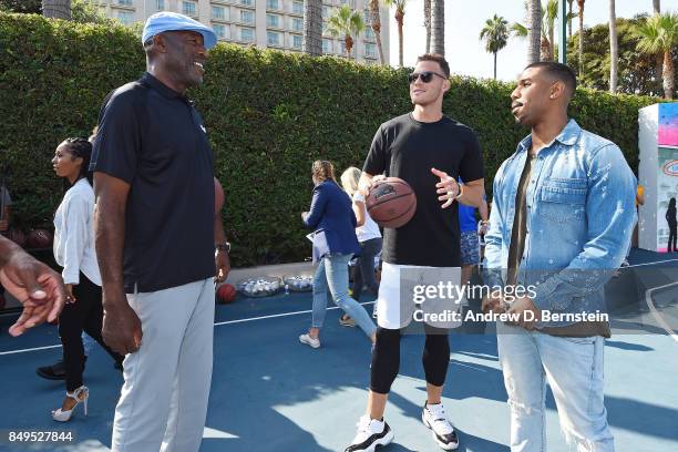 Former NBA player, James Worthy and Blake Griffin of the LA Clippers talk with Michael B. Jordan during his Jam event at The Ritz-Carlton Marina del...