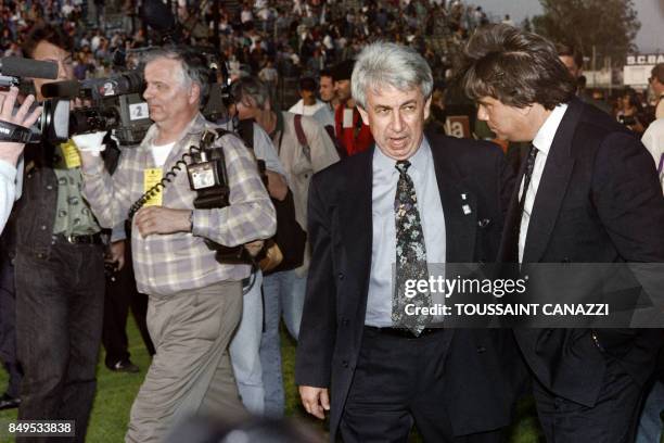 Picture dated May 05, 1992 shows Presidents of the SC Bastia Jean-françois Filippi and of the Olympique de Marseille Bernard Tapie meeting on the...