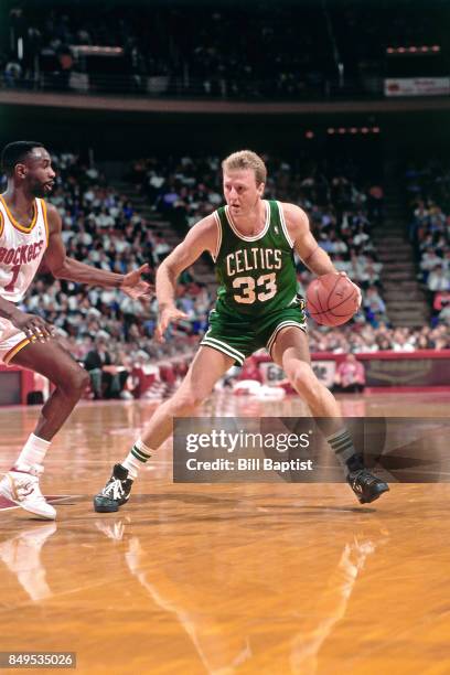 Larry Bird of the Boston Celtics drives circa 1989 at the Summitt in Houston, Texas. NOTE TO USER: User expressly acknowledges and agrees that, by...