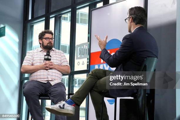 Actor Bobby Moynihan and moderator Ricky Camilleri attend Build to discuss "Me, Myself & I" at Build Studio on September 19, 2017 in New York City.