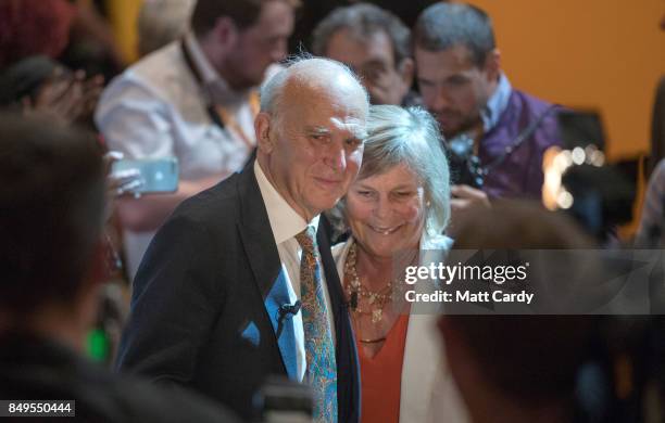 Leader of the Liberal Democrats Vince Cable and his wife Rachel leave the auditorium after he delivers his keynote speech during the final day of the...