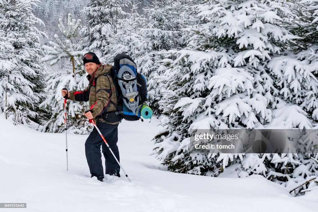 Man hiking in winter